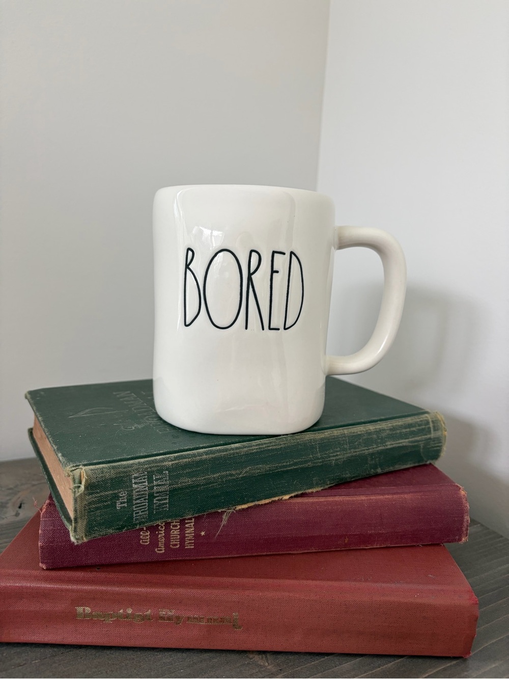 Rae Dunn White Ceramic Mug with 'BORED' Black Lettering